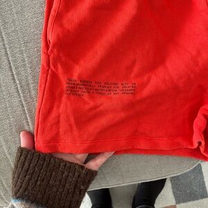 Pangaia hot orange sweat shorts